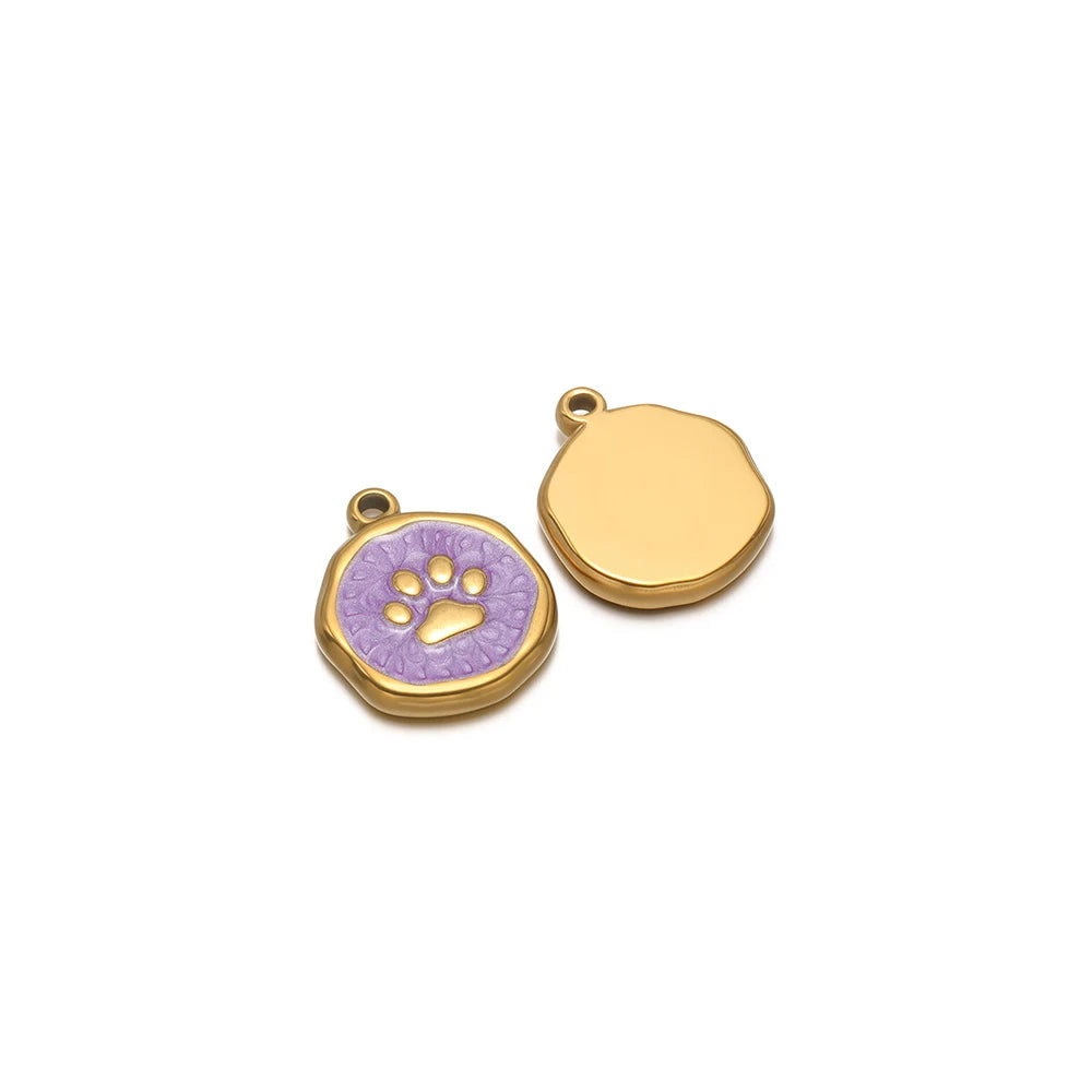 Round enamel charm pendant with gold border, purple paw print design and plain gold charm