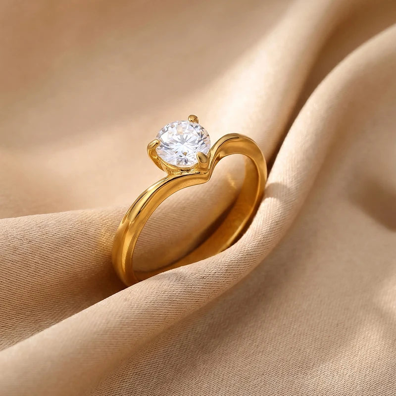 Gold-tone heart-shaped prong solitaire ring with round cubic zirconia center