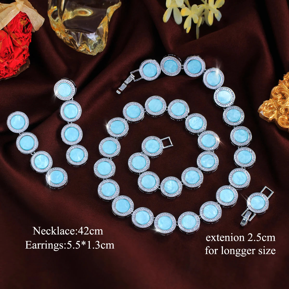 Light blue round halo necklace and earrings set with extension chain