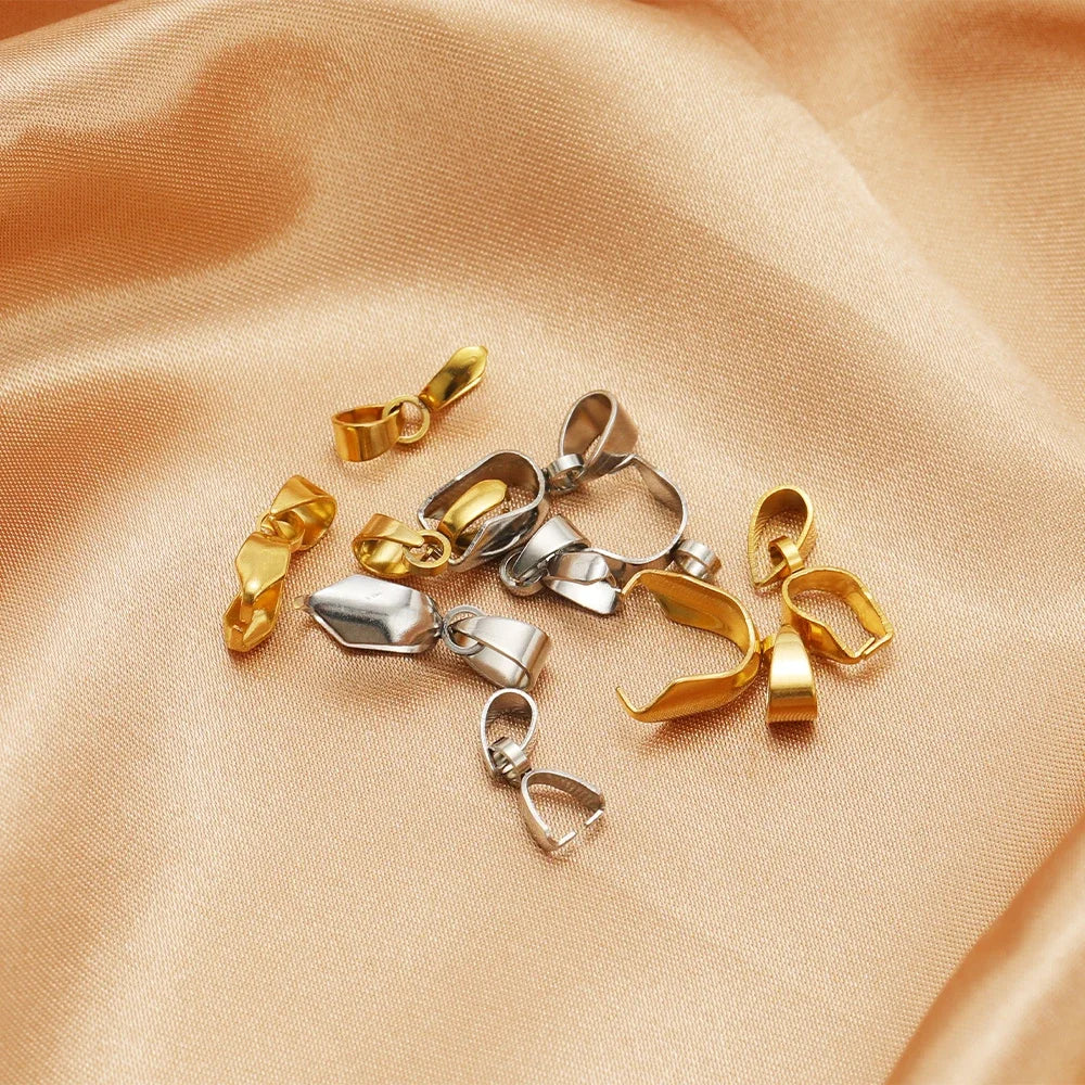 Small mixed gold and silver loop bail connectors, pinch style jewelry clasps