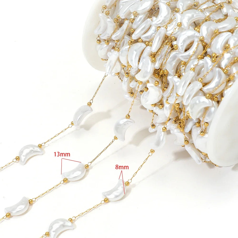 Artificial pearl chain with gold links and 13mm white oval beads