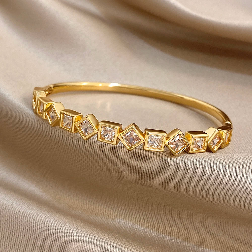 Gold-tone square-stone geometric cuff bracelet, slim curved band design