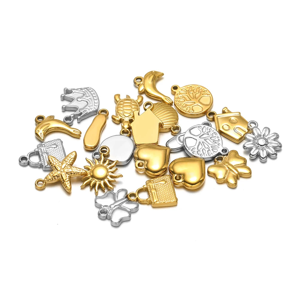 Assorted gold and silver stainless steel animal charms with star and sun designs