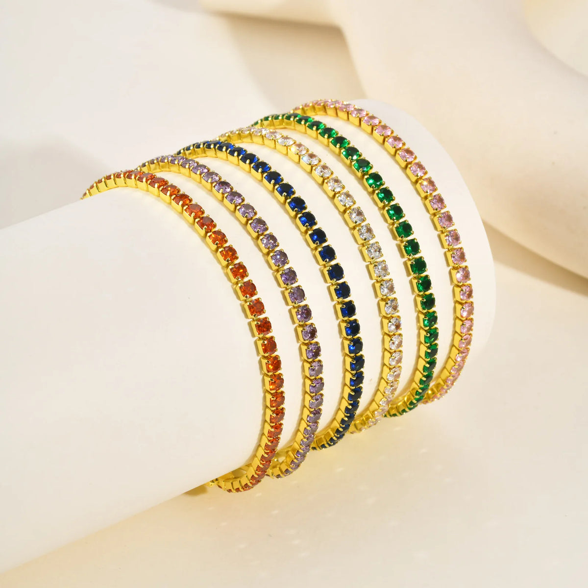 Colorful tennis bracelet with multicolor cubic zirconia and gold-tone bezel links