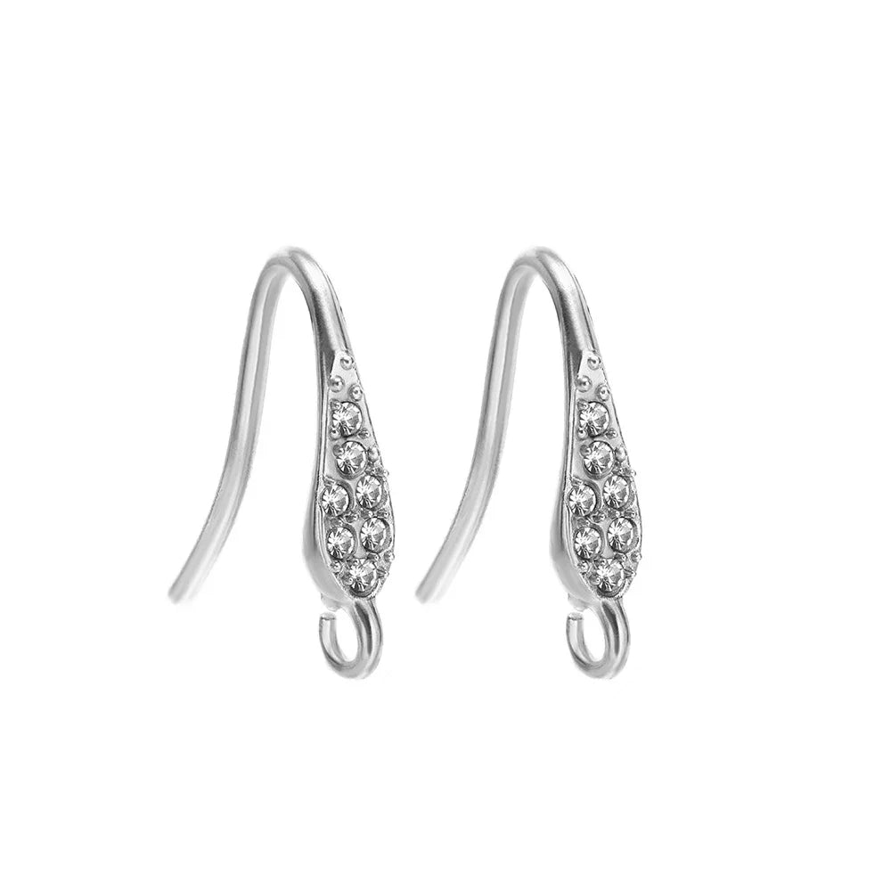 Silver-tone ear wire hooks with textured crystal-row front plates