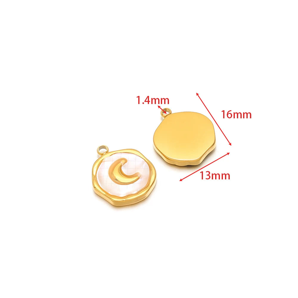 Gold heart-shaped shell pendant charm with clear resin heart backing
