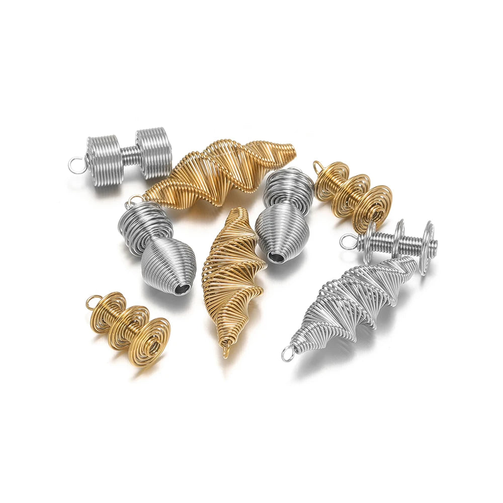Spring-effect charm pendants, assorted gold and silver wire spiral and ribbon shapes