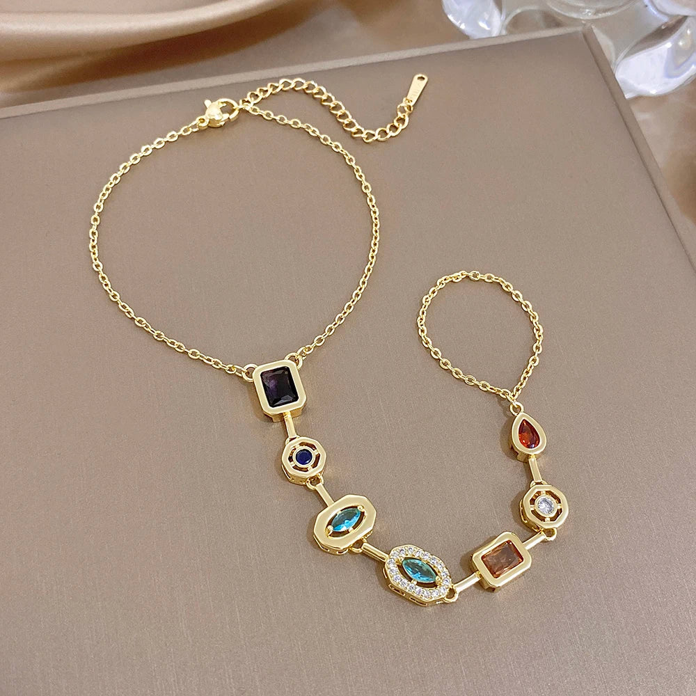 Gold-tone geometric zircon bracelet with colorful square and oval links, adjustable chain