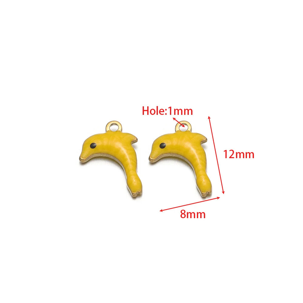 Two yellow enamel dolphin charms with gold-tone loops and side profile