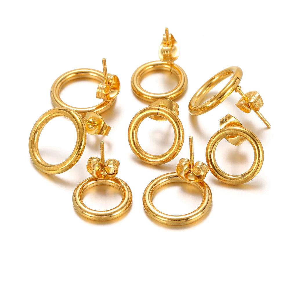 Gold round hollow stud earrings set (10 pairs) laid out, circular hoop design