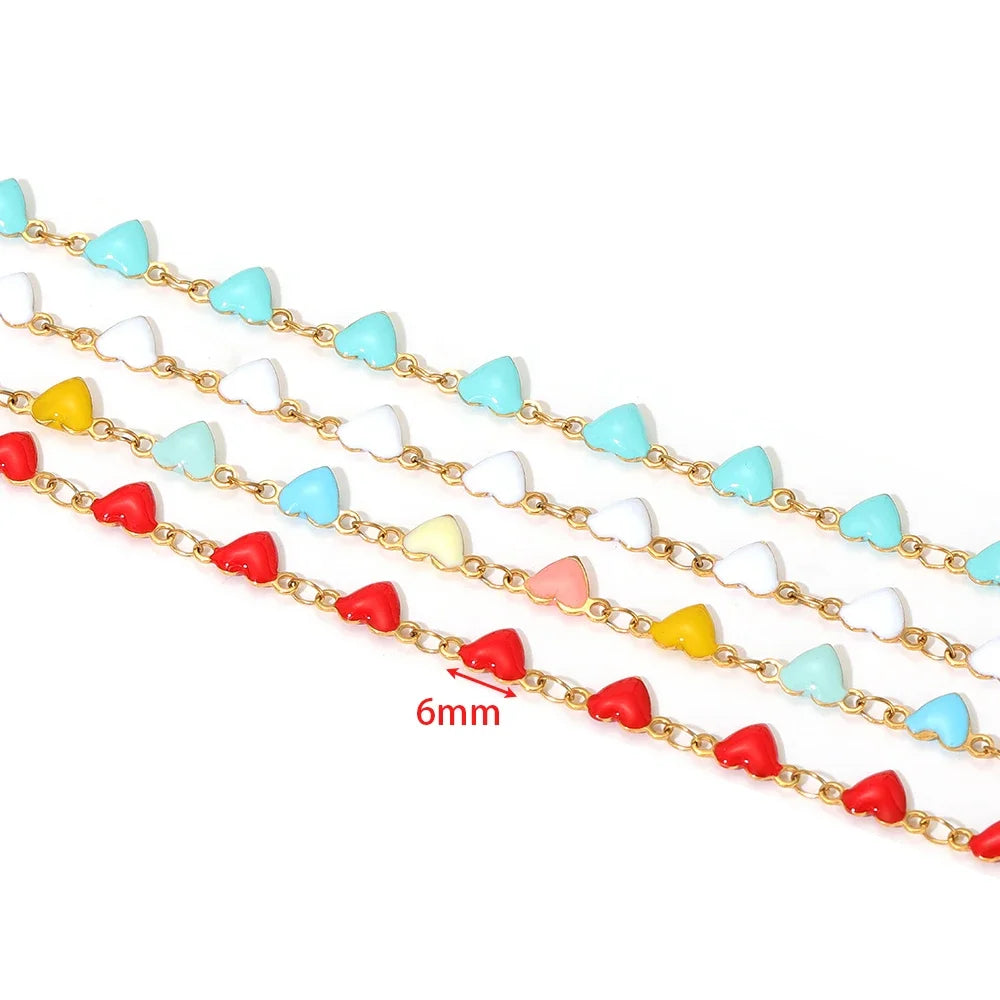 Enamel heart charm chain with blue, red, pink, and yellow hearts on gold-tone links