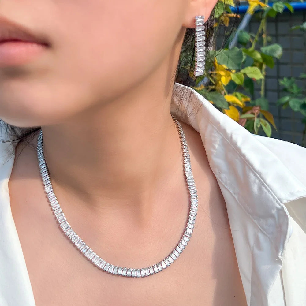 Silver-tone rectangular stone necklace and matching long drop earring, worn