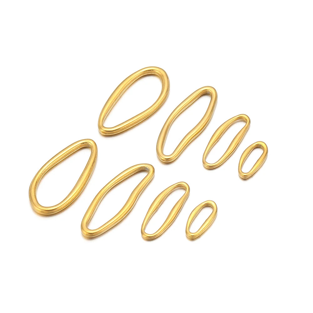 Gold irregular oval charm links, mixed sizes, compact set