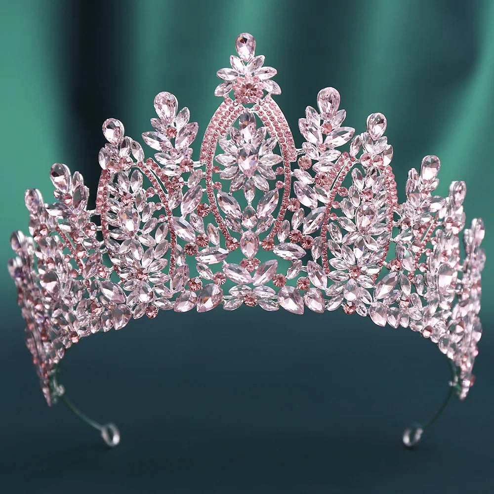Silver crystal tiara crown with floral accents and curved rhinestone centerpiece