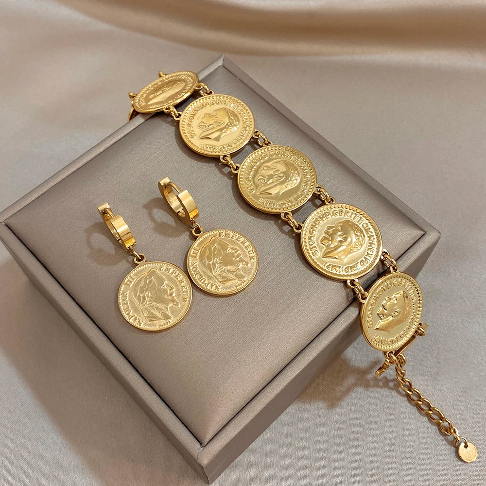 Gold coin charm bracelet with matching hoop drop earrings