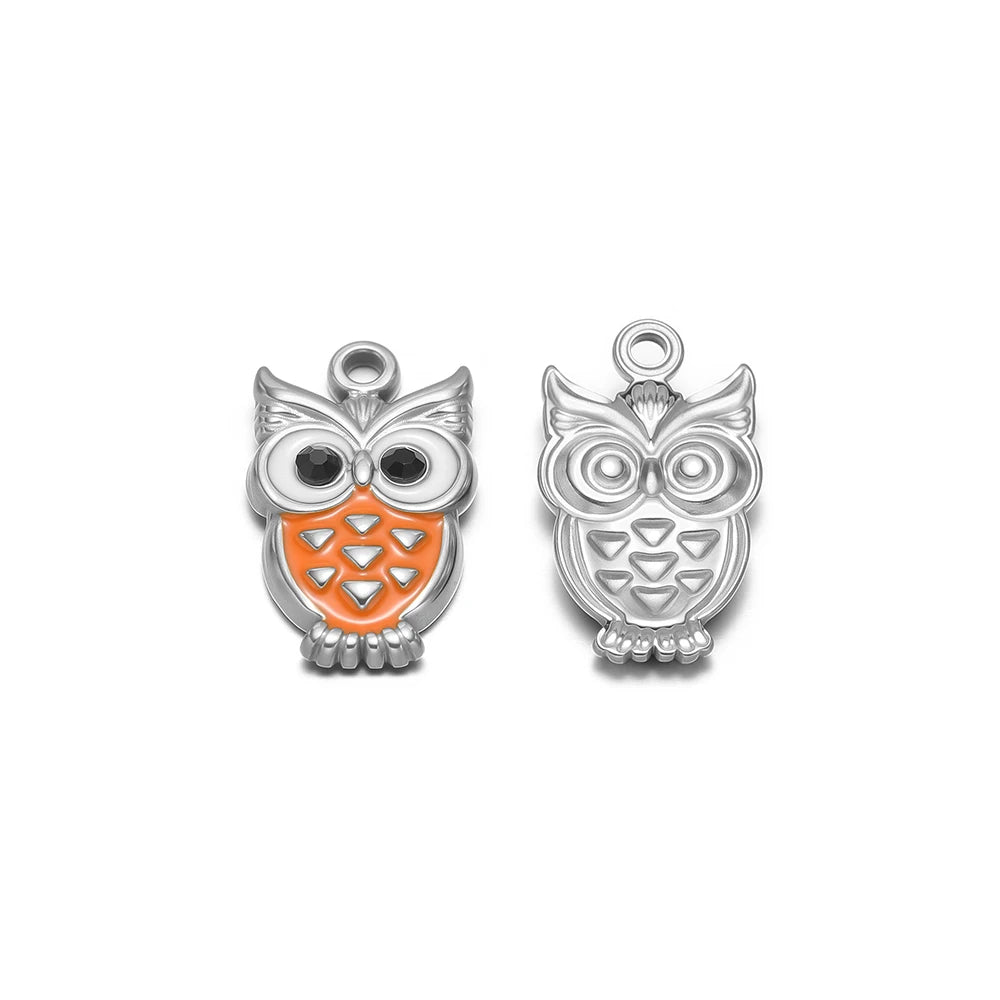 Silver-tone enamel owl charms, two pendants: one with orange belly, one plain etched silver