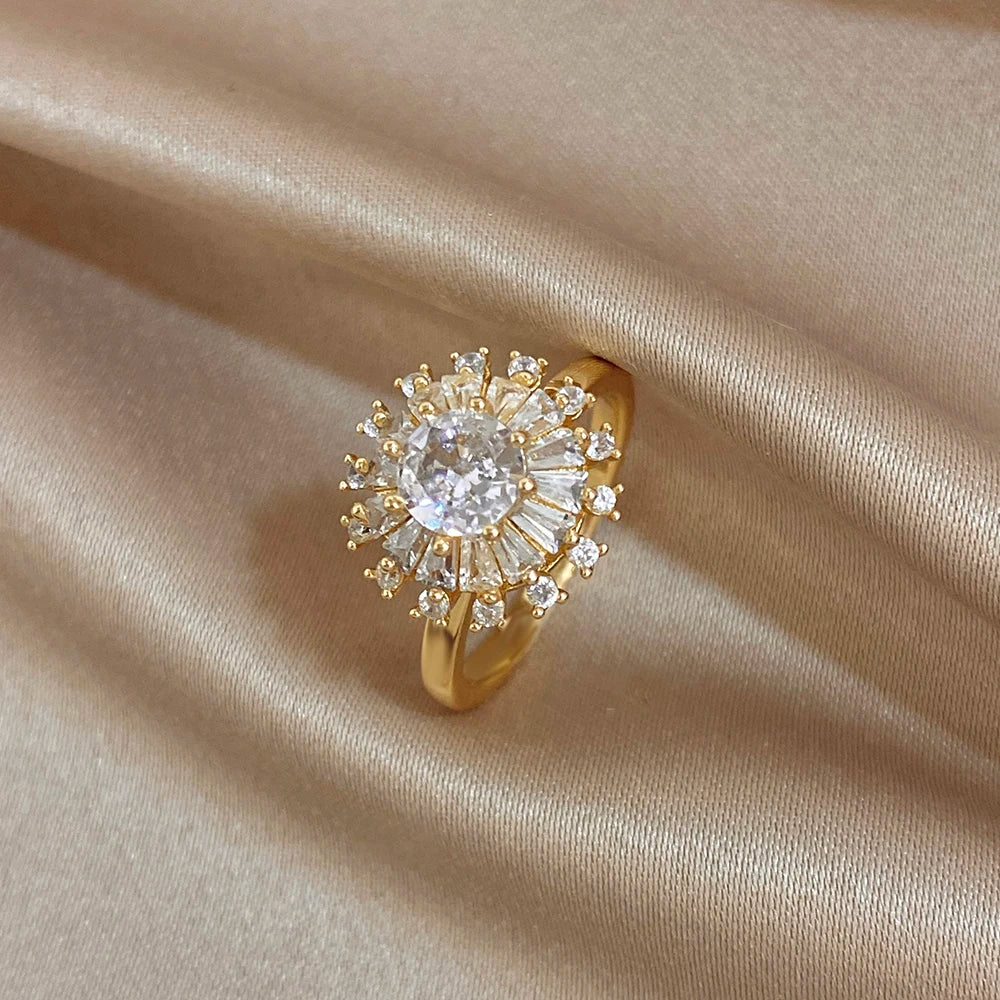 Gold-plated copper clear flower zirconia ring with gold band and prong setting