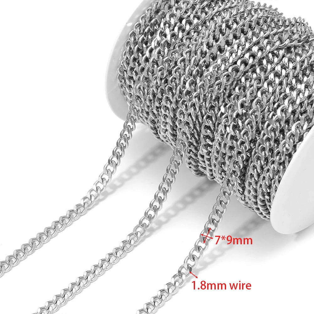 Steel Cuban link chain coil on a spool, strands draped in front