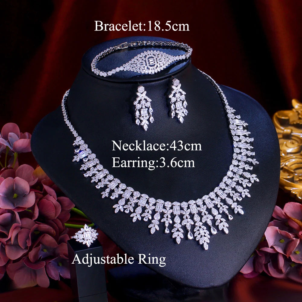 Cubic zirconia jewelry set with necklace, bracelet, drop earrings, and adjustable ring