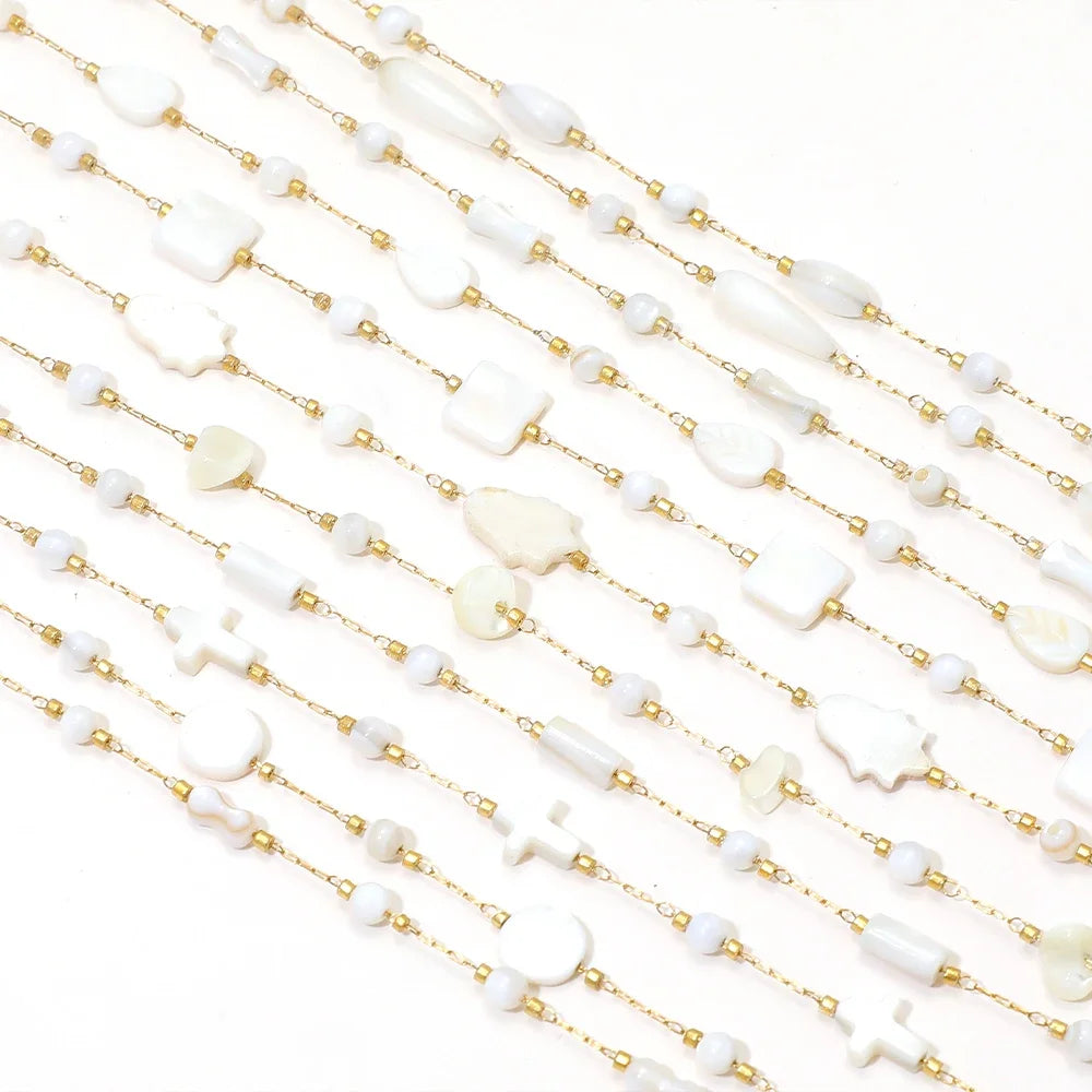 Long white shell-style bead chains with gold-tone links for necklace and earring making