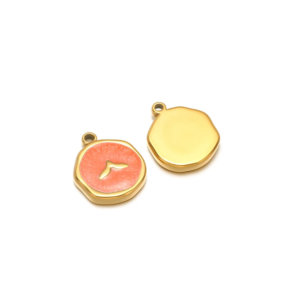 Pair of enamel ocean charms: yellow shell charm and coral seashell charm with gold fish