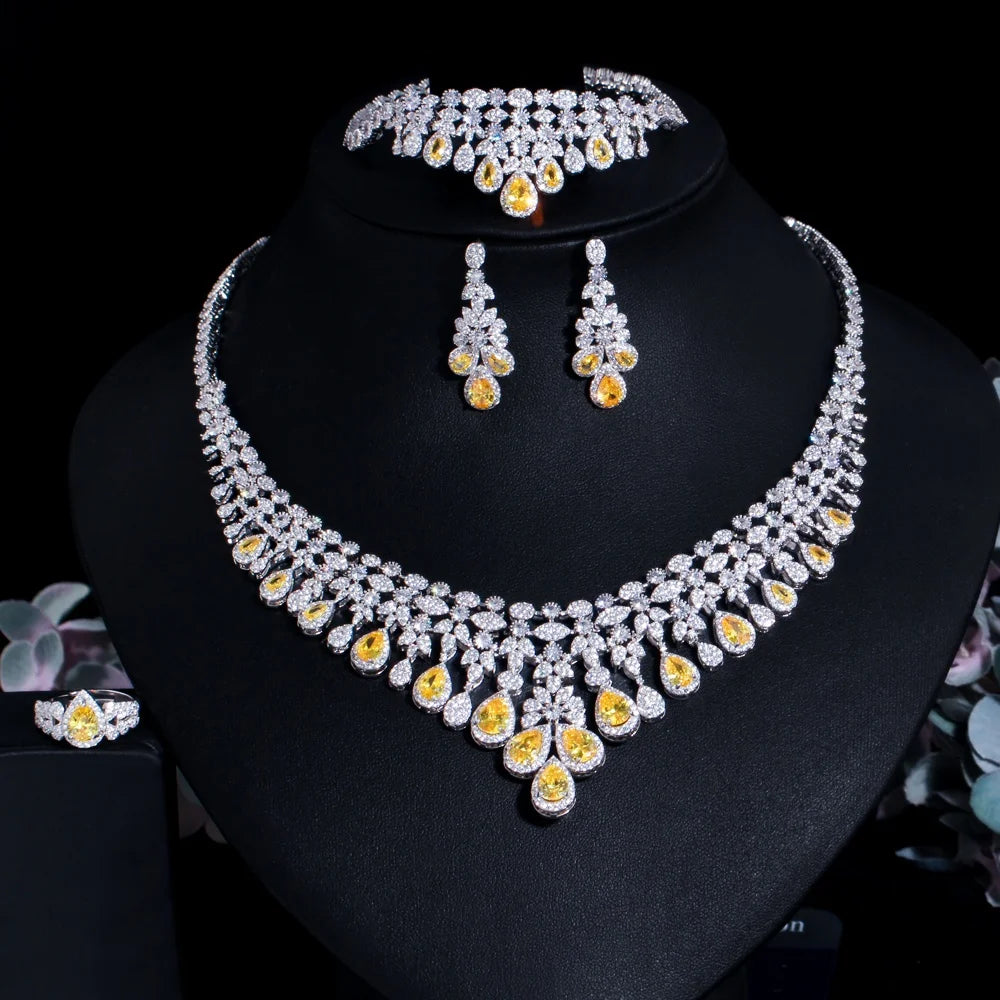 Rhinestone necklace with yellow and clear accents, plus matching earrings and ring