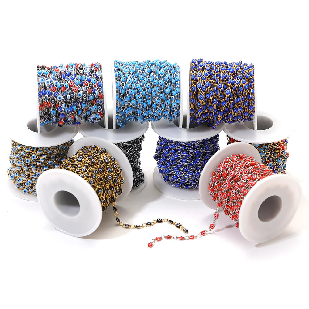 Evil eye bead chain bulk rolls with gold, blue, and black-tone evil eye beads on links
