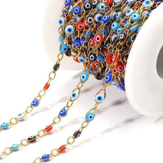 Evil eye bead chain strand with gold-tone links and blue/red/black oval beads
