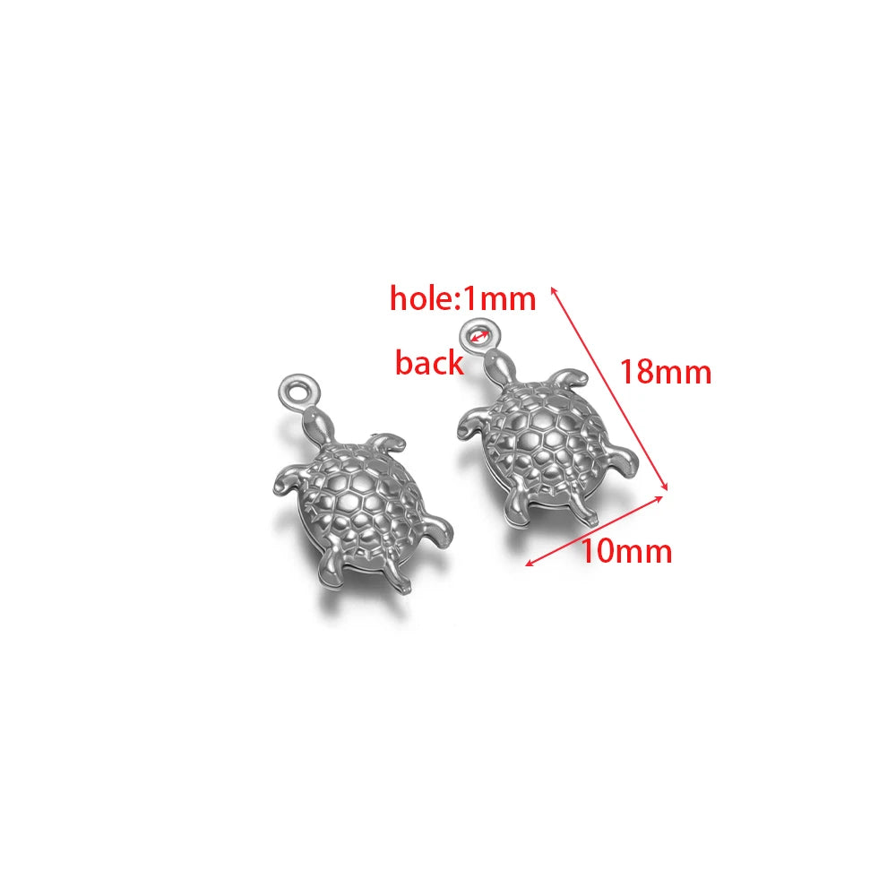 Silver turtle-shaped stainless steel hollow charm with round loop, for necklace or earrings