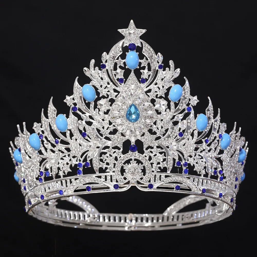 Silver-tone crystal bridal tiara with blue gem accents and central teardrop motif