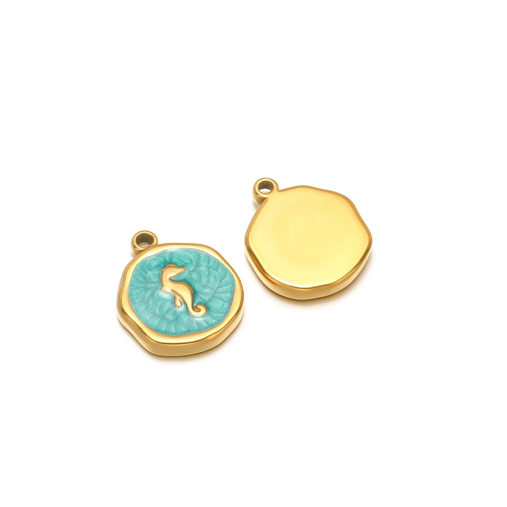 Enamel shell charm pendants, one turquoise with gold seahorse design and one yellow plain cap