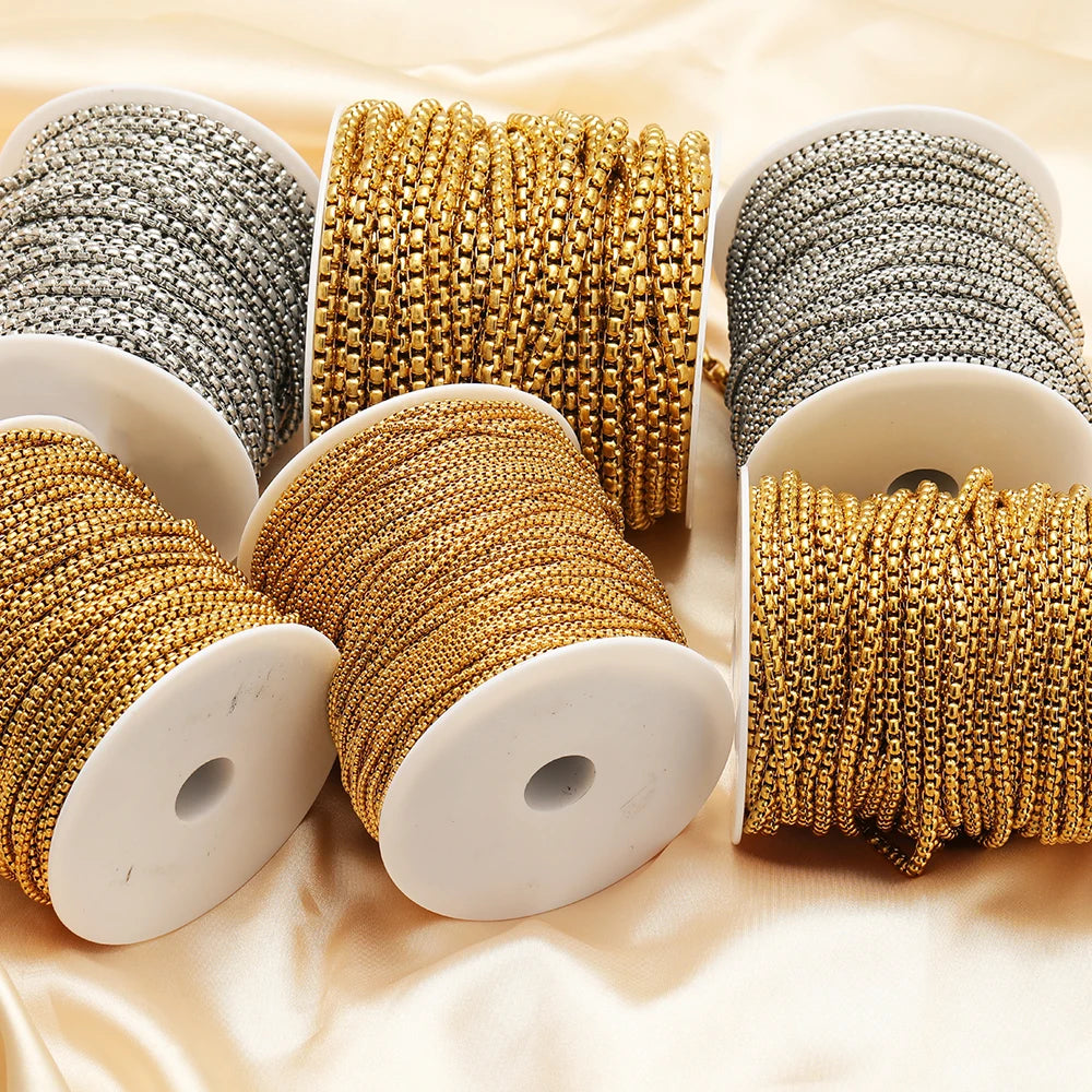 Jewelry chain on spools set: gold and silver rolo box link strands