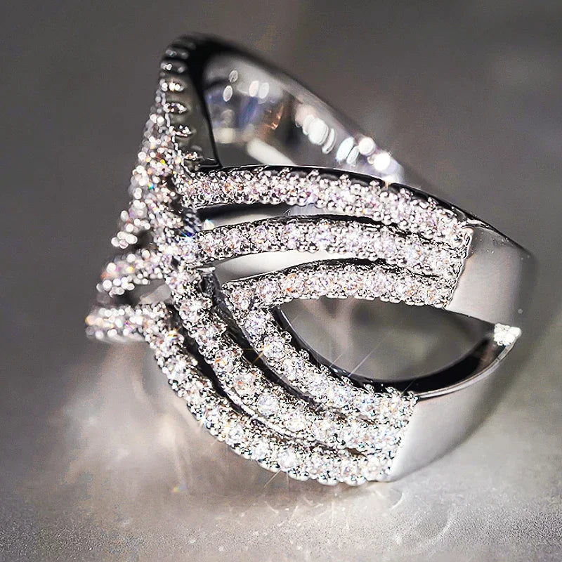 Sparkling CZ hollow cross ring with silver-tone band