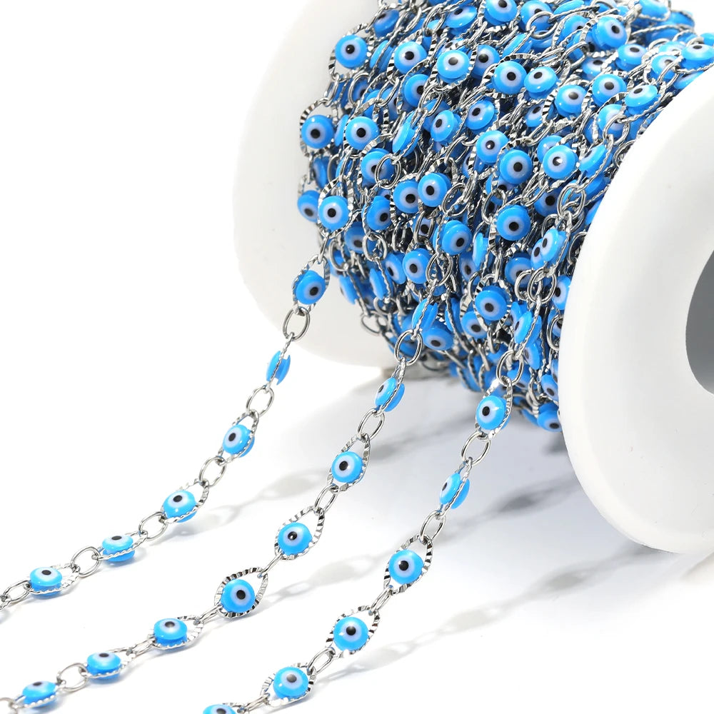 Light blue evil eye bead chain strand with silver-tone links and oval blue eye beads