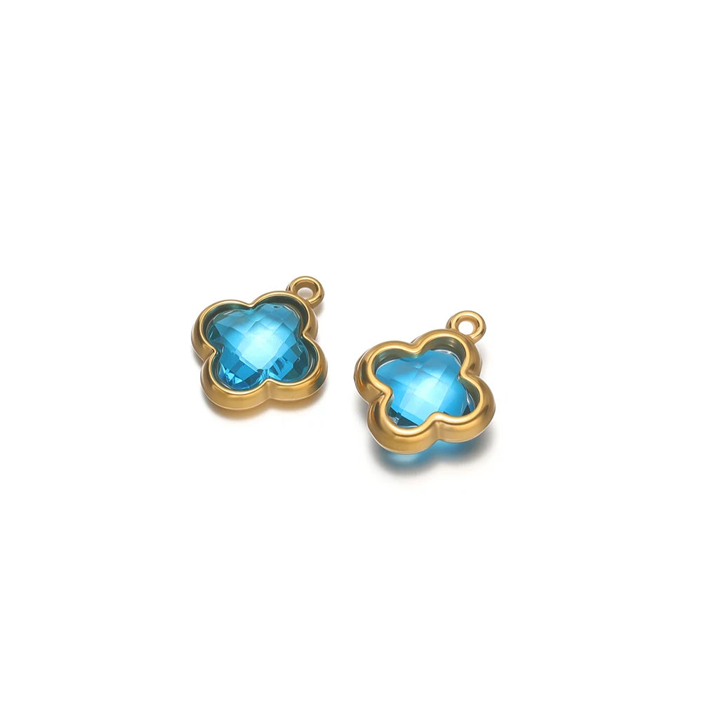 Clover glass pendant charm, blue stone with gold-tone frame and connector loops