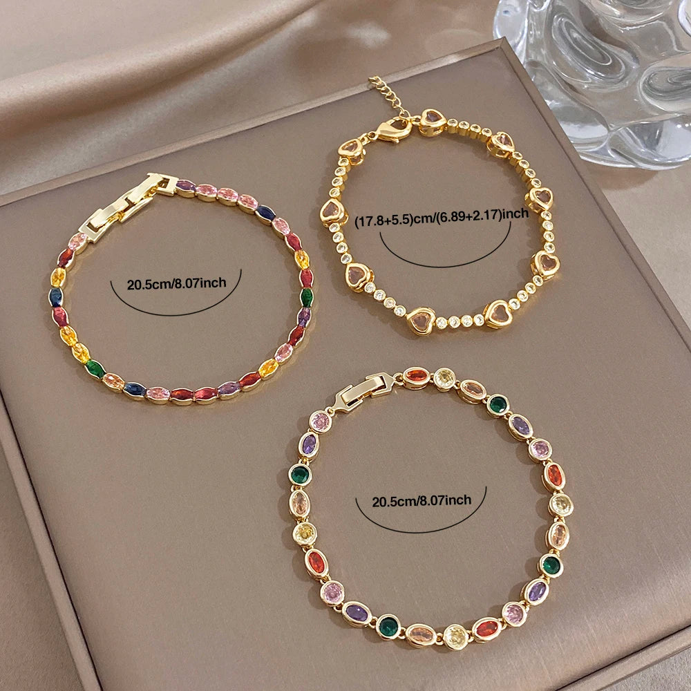 Gold-plated chain bracelet with multicolor oval zircon beads and toggle clasp