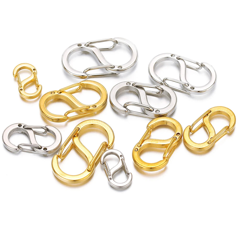 Gold-tone and silver-tone spring lobster clasp connectors with hinged safety gates