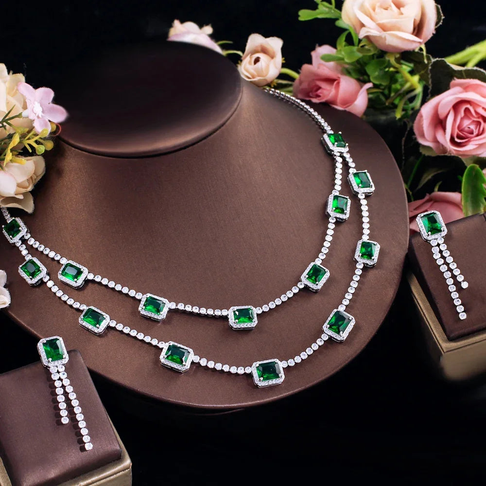 Green CZ rectangular double-layer necklace set with matching beaded drop earrings on display
