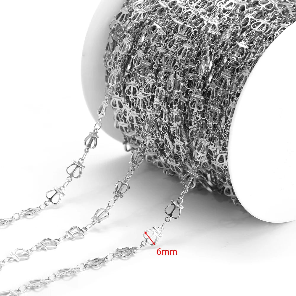 Silver hollow chain with loop links, 6mm width shown, on a white spool