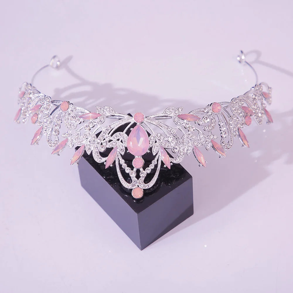 Jeweled bridal tiara crown with pink oval center stones and crystal floral detailing