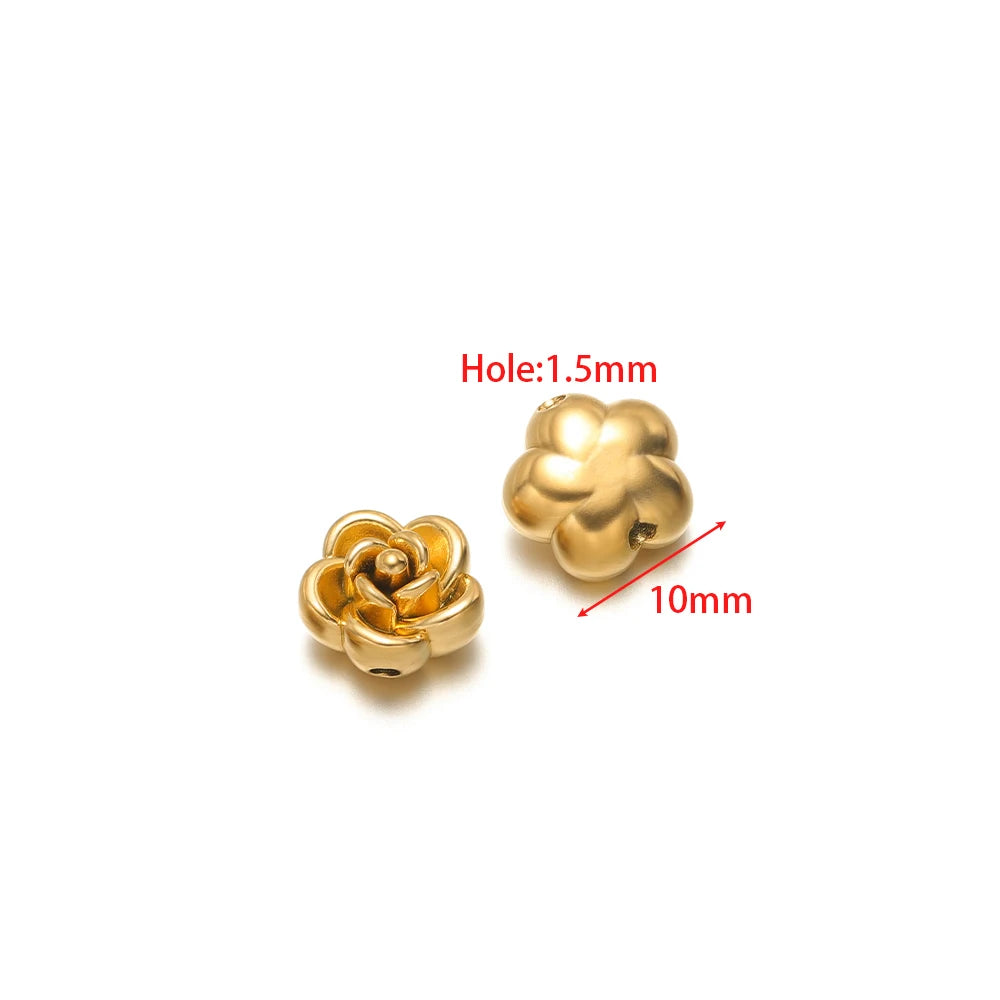 Single gold rose flower charm pendant with top loop for attaching to jewelry