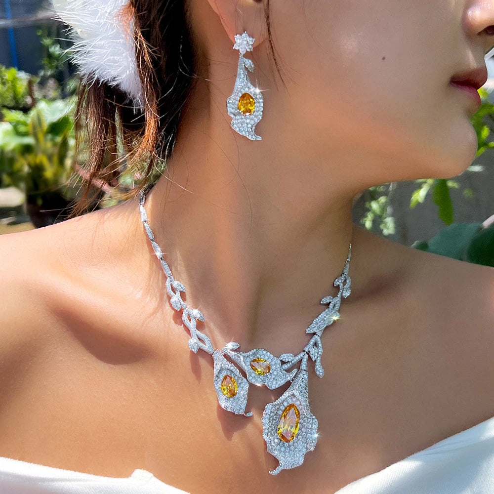 Calla lily cubic zirconia necklace and matching drop earrings with yellow stones