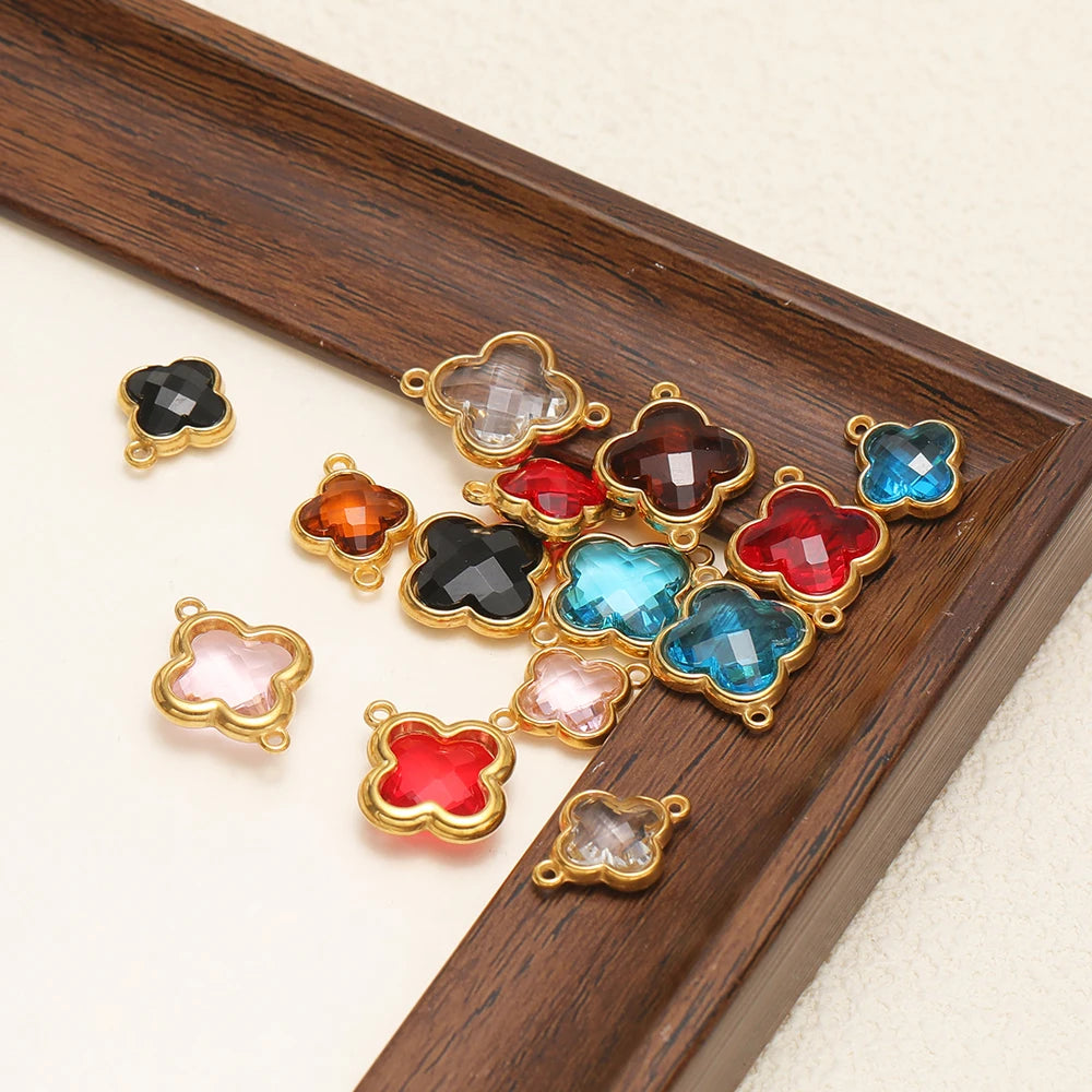 Multicolor clover glass pendant charms with gold-tone frames and connector loops