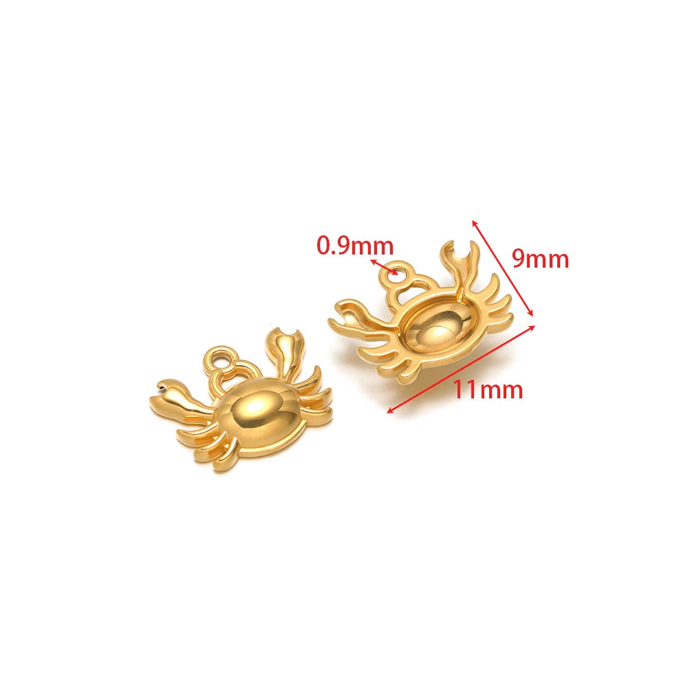 Stainless steel animal charm pendants set, fish shaped with gold-tone finish and connector loops
