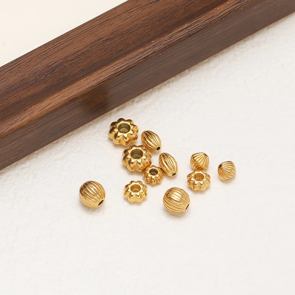 Gold-plated striped pumpkin spacer beads and flower-style spacer beads for DIY jewelry