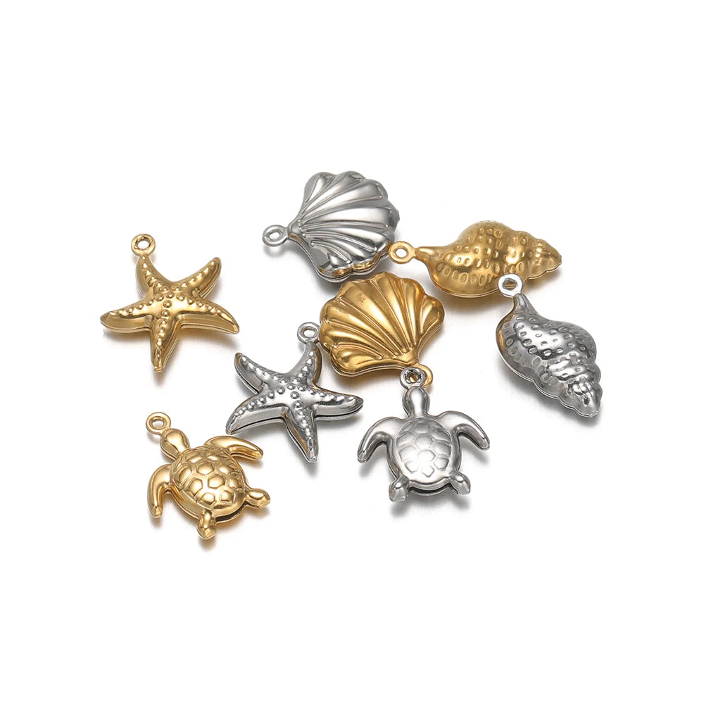 Hollow sea animal charms: gold and silver starfish, shells, turtle, and conch pendants