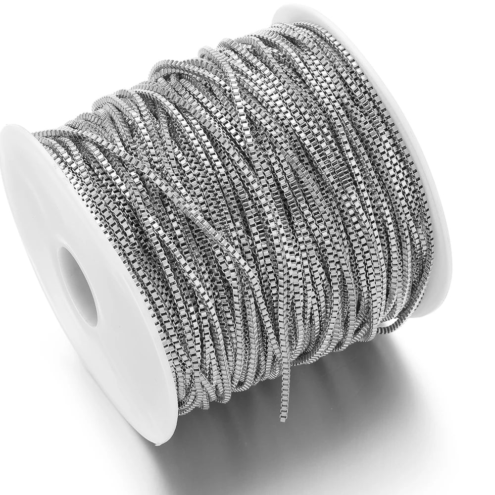 Steel color box chain in stainless steel, 2mm width, on a white spool for DIY jewelry making