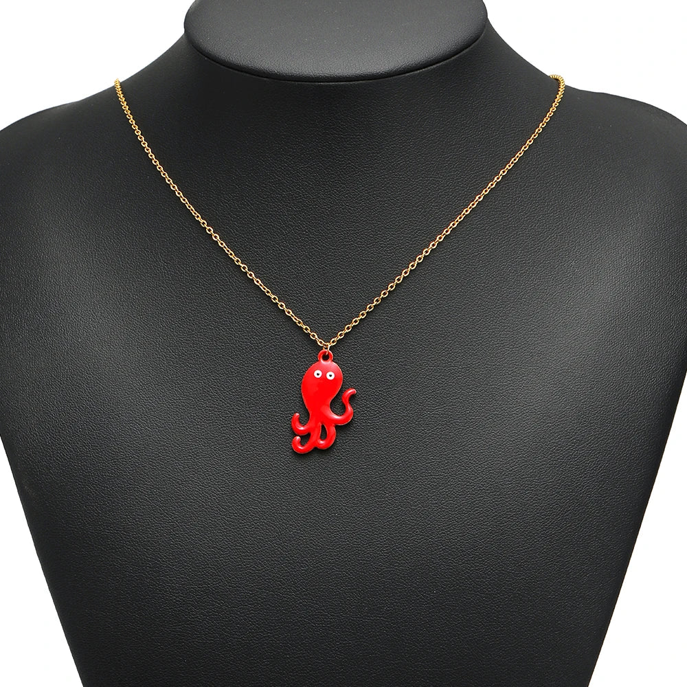 Gold chain necklace with red enamel octopus pendant charm