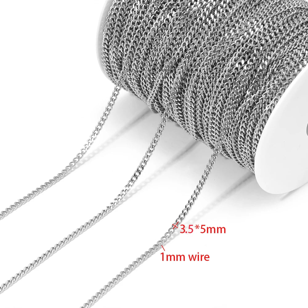 Steel Cuban link chain on a spool, with short chain strands hanging