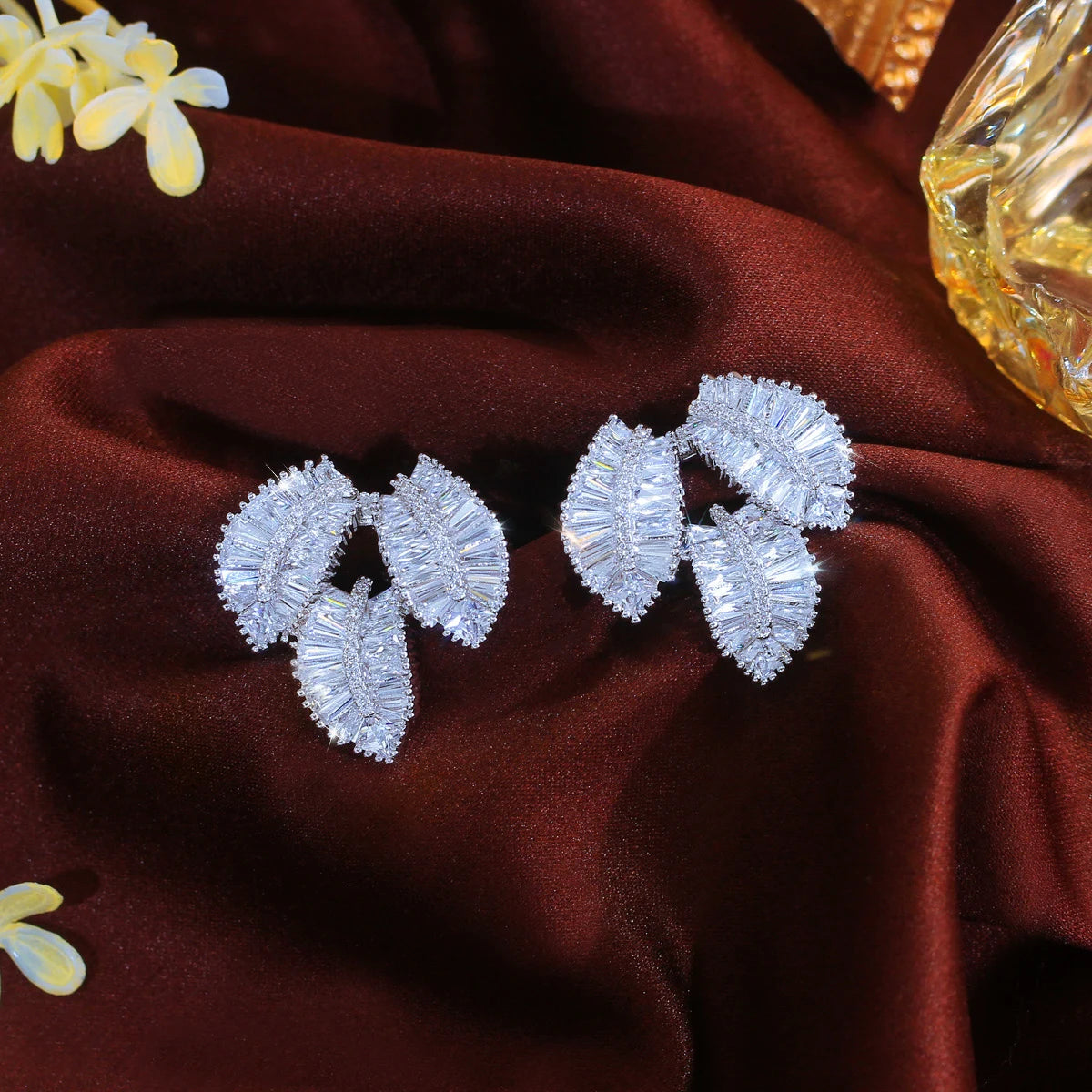 Leaf cubic zirconia dangle earrings in shiny white